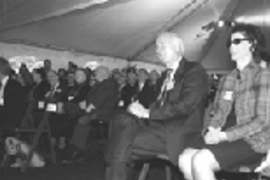 Ray and Maria Stata enjoy a moment at the groundbreaking ceremony for the building complex named after them.