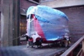 The car arrives at MIT wrapped in cellophane.