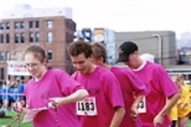 Members of the New-Tang Clan team participate in the "Slide Rules" event. Front to back: Kate Ryan, Chris Brooks, Chris Rycroft, Scott Litzelman.