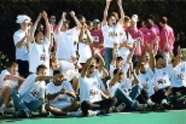 Members of the Ashdown Fire/Smoke team cheer for their teammate Irina Medvedev (S.B. 2001) who has just won the "Howard Sez" event, patterned after the children's game "Simon Says."