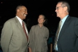 News Office Director Arthur Jones (left) exchanges pleasantries with Vice President Kathryn A. Willmore and President Charles M. Vest at the freshman convocation Monday.