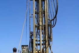 Personnel from the Water Resources Board in Sri Lanka drill for water in a displaced persons' camp in Amparai.