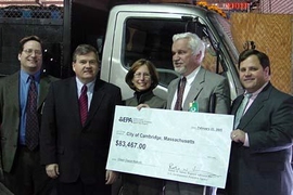 Officials from Cambridge and MIT receive a grant award check from the EPA. From left: Steven Lanou, MIT Environmental Programs Office; Robert Varney, EPA Regional Administrator; Jamie Lewis Keith, MIT Managing Director of Environmental Programs and Risk Management, Senior Council; Paul Parravano, co-director, MIT Office of Government and Community Relations; and Mayor of Cambridge Michael Sullivan...