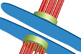 Chromosomes (blue) are shown being pulled apart by microtubules (red). The green represents the cement-like substance that establishes the connection between microtubules and chromosomes. MIT researchers recently pinpointed two proteins that are key to normal cell division.