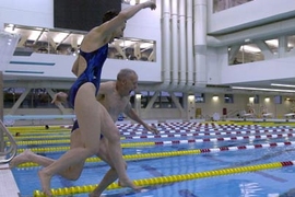 Barrie and Al Zesiger leap into one of two pools at the MIT fitness center that bears their names. The Al and Barrie Zesiger Sports and Fitness Center won a recent popular vote for 'Best Swimming Pool' in the Boston area.