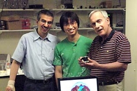 From left: Kamran Badizadegan, principal research scientist; Wonshik Choi, postdoc; and Michael Feld, physics professor and director of the MIT Spectroscopy Lab. The three have found a way to create 3D images of the inner workings of cells, as illustrated on monitor in front of them.