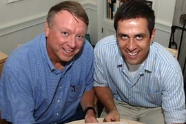 Ned Thomas, Morris Cohen Professor of Materials Science and Engineering and head of the department, left, and Joseph Walish, graduate student in materials science and engineering, display a new structured gel that can rapidly change color in response to a variety of stimuli.