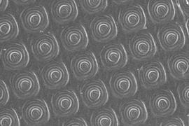 An array of microbattery electrodes, each only about four micrometers, or millionths of a meter, in diameter.