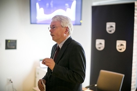 Henk van Houten speaks during the signing ceremony