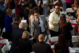 Sergio Cantu shakes hands with President Reif. “We need to help empower others,” Cantu said during his speech. 