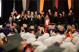 MIT faculty applauded at the Institute’s Investiture of Doctoral Hoods on June 8, 2017.