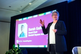 Sarah Gallop, who serves as chair of the board at the Kendall Square Association (KSA) and co-director of MIT’s Office of Government and Community Relations, speaks to the crowd at the KSA’s 10th annual meeting April 3.