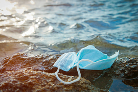 face mask on the beach