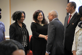 Neves shakes hands with smiling members of the MIT community after the talk.