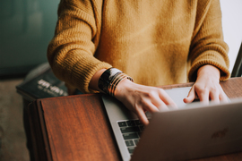 A person working at a laptop