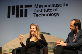 Ev Fedorenko and Antonio Torralba speak on-stage during a roundtable discussion