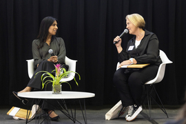 Bhatia and Preminger sit on stage in conversation.