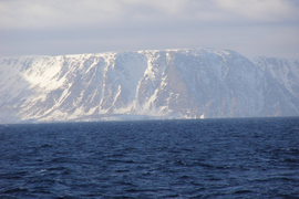 Ocean water off a snow coastline