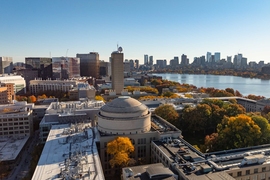 Aerial view of campus in the fall, with colorful trees.