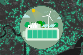 An icon shows solar panels and batteries. A map of Cambridge in the background.